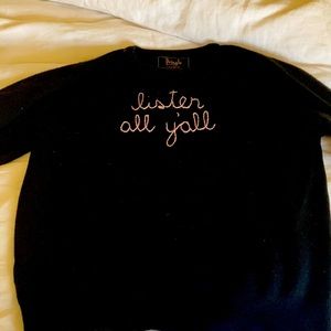 Hand embroidered cashmere sweater.